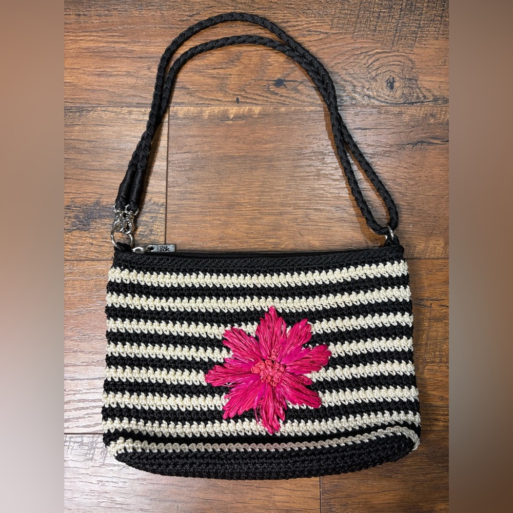 The sak woven crossbody pink Black White Striped Bag with Flower